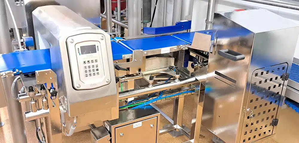 détecteur de métaux industriel pour ligne conditionnement
