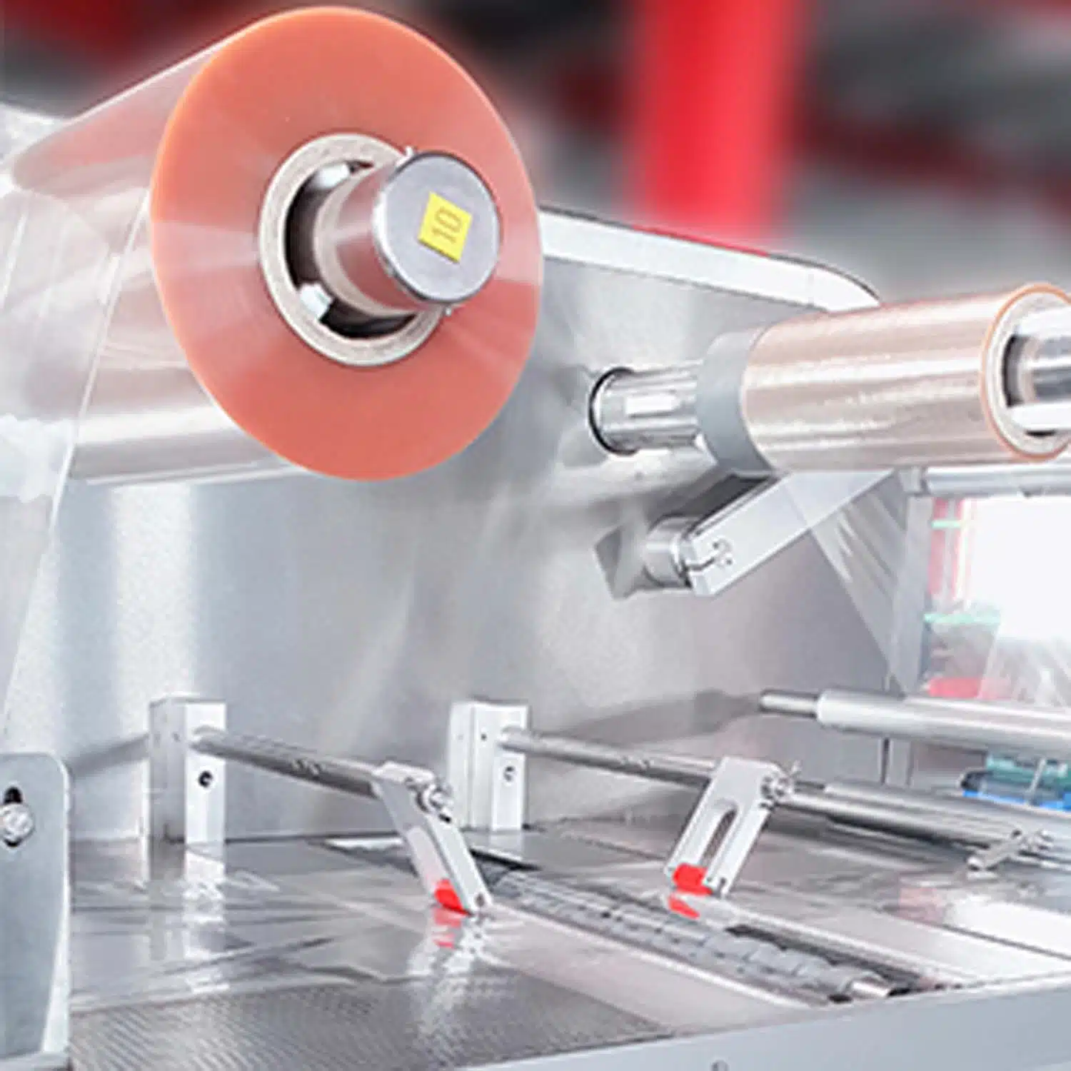flowpack intégré à ligne de production industrielle