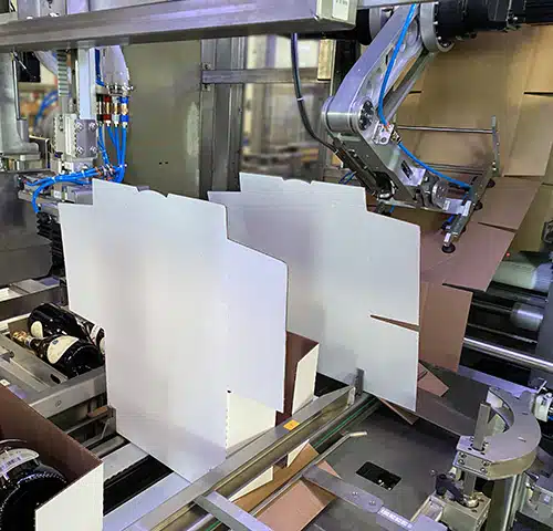 Module de groupage et Encaisseuse de bouteilles de champagne