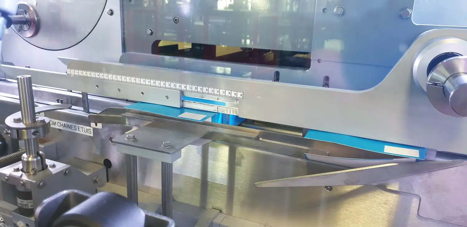 Étuyeuse industrielle latérale pour la mise en étui automatique