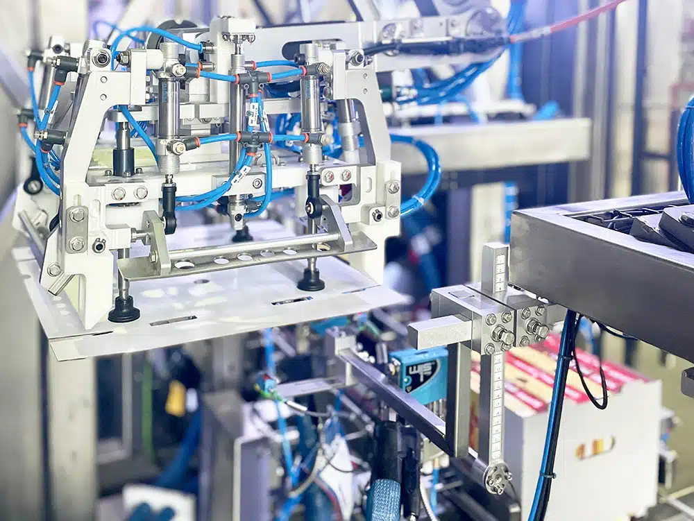 Machine encartonneuse sur ligne de conditionnement Ixapack