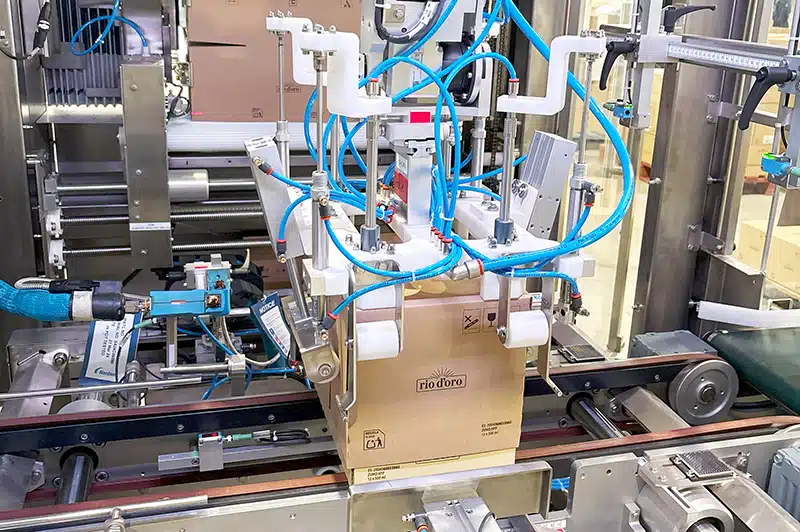 machine encartonneuse application coiffe carton Ixapack