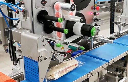 étiqueteuse industrielle automatisée Ixapack