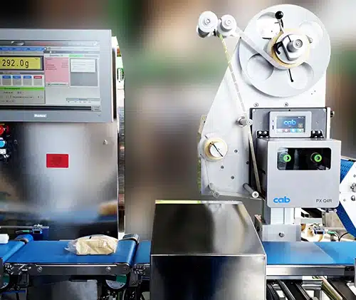 Ixapack cheese weighing and labeling module